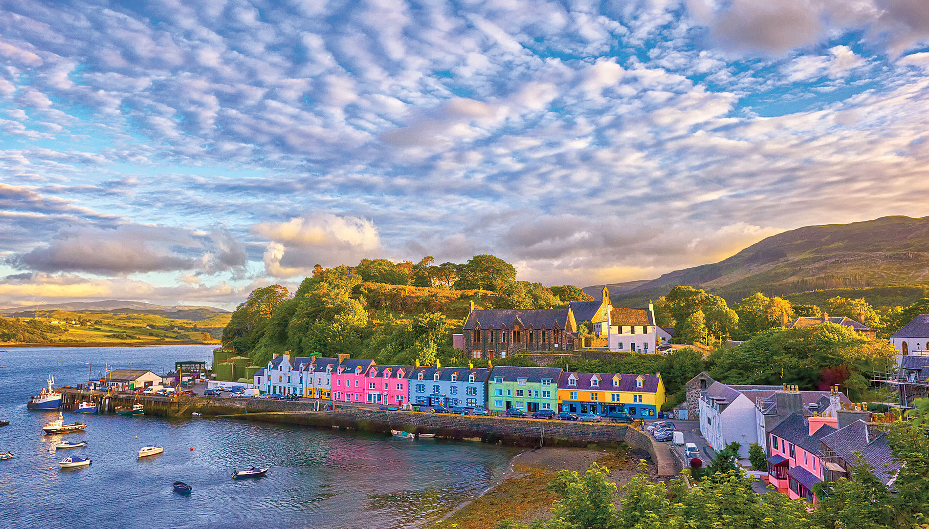 Colorful buildings of Portree Harbor in Scotland