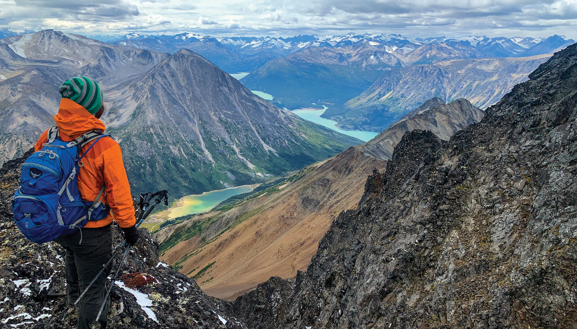 A Chilkoot Trail hiker takes in the mountains