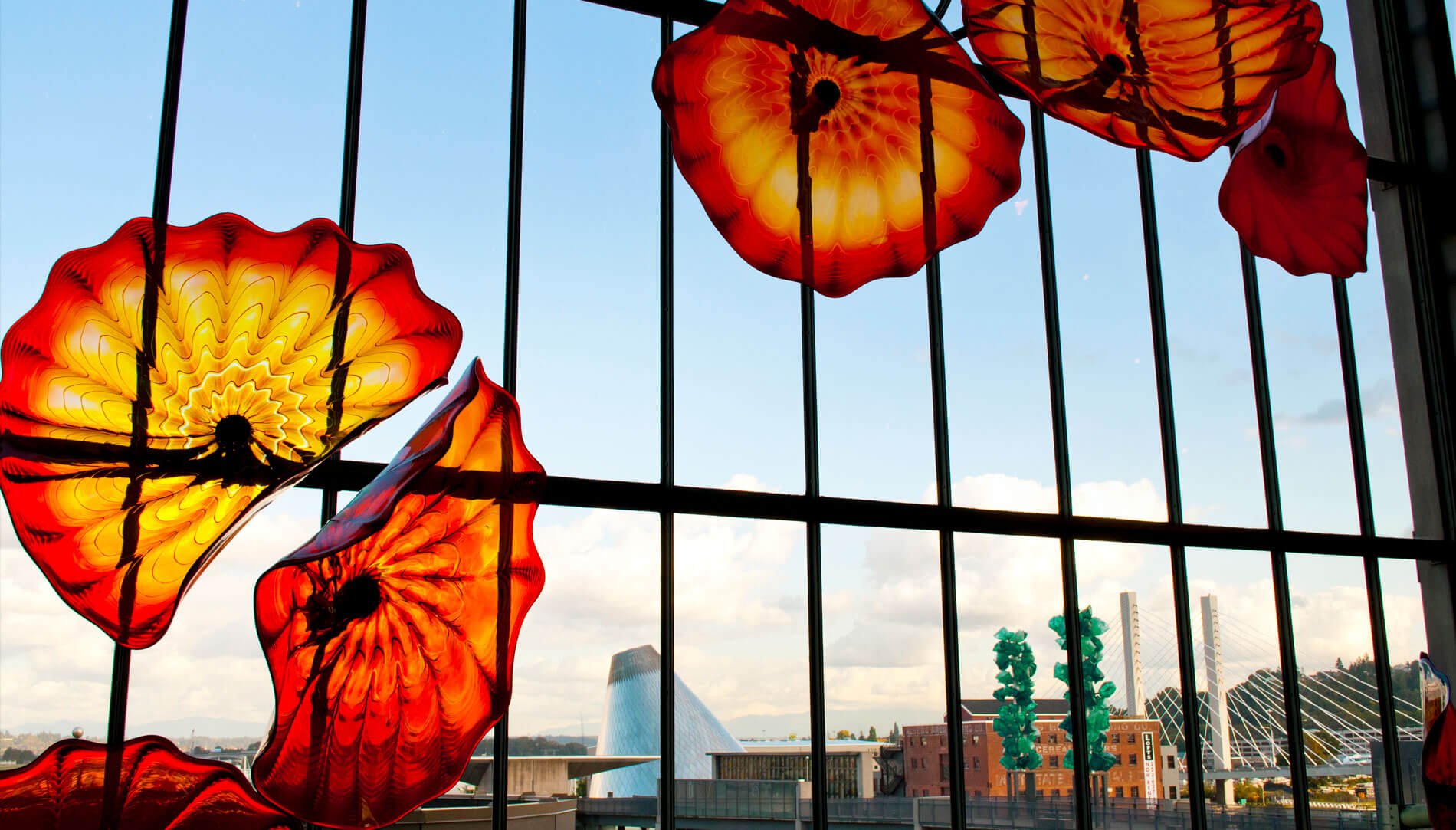 Glass art installation Union Station MoG and Chihuly Bridge of Glass in the background Credit Travel Tacoma