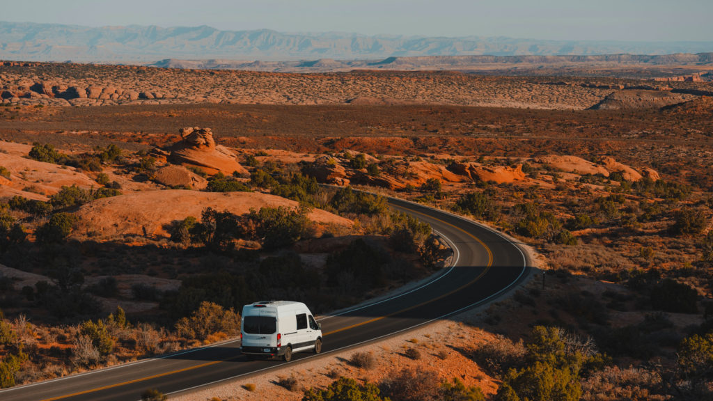 Plan a long-distance road trip in an RV or camper van.