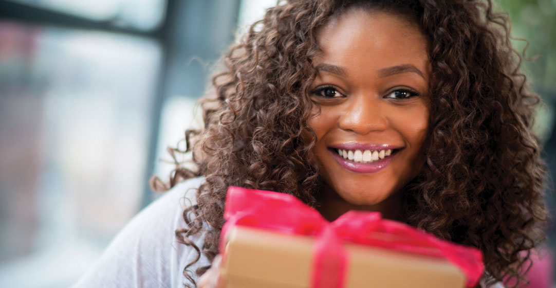 Great holiday gifts, girl receiving present
