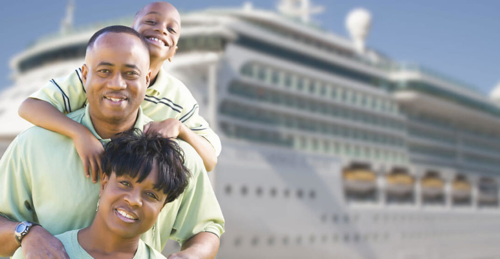 Family in front of a cruise ship