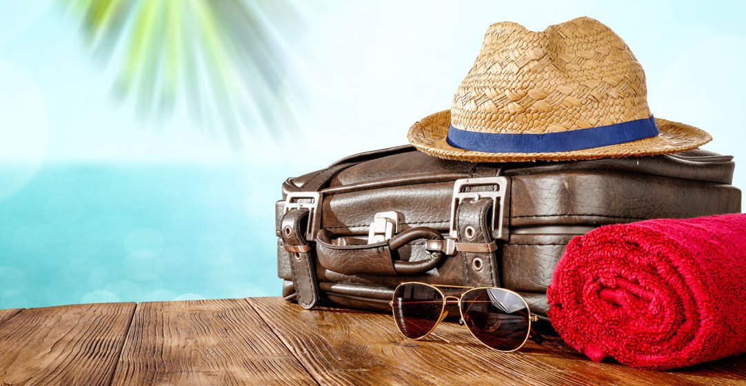 Hat, sunglasses and beach towel 