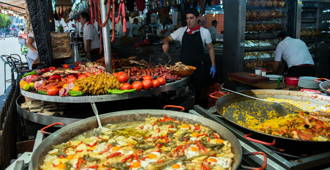 Street food in San Fermin feast Pamlona Navarra Spain Paella by Khorzhevska AdobeStock
