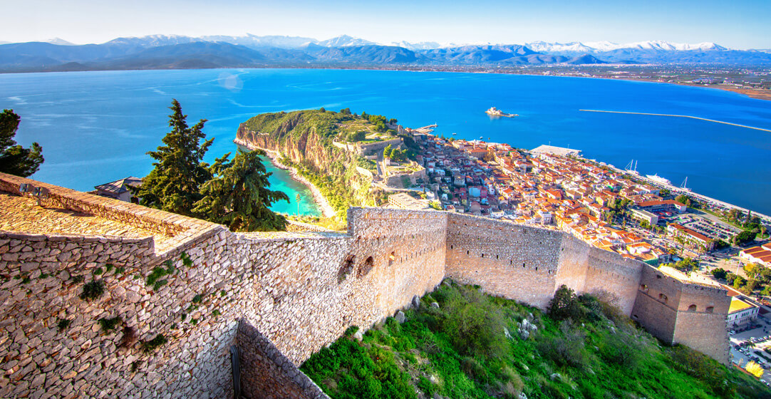 Greek Travel Nafplion in Greece and bourtzi castle Gatsi AdobeStock