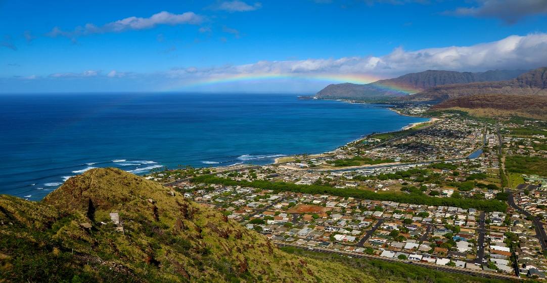 Hiking Hawai'i is a once-in-a-lifetime experience with spectacular views, waterfalls, rugged coastlines and sandy beaches. Picture here, the view from the Puu O Hulu Hike, Oahu.