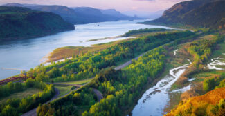 view of the Columbia river gorge, pinkish sky