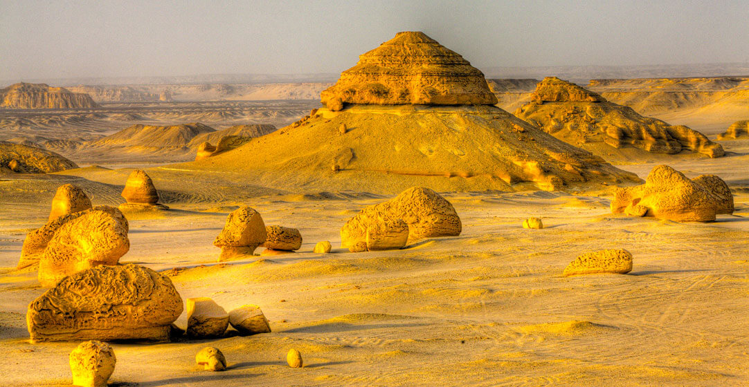 rocks and desert landscape in Wadi Al Hitan or Whale Valley, Egypt