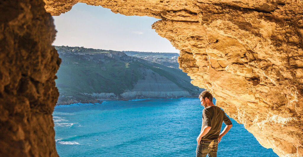 Ramla Bay in Malta as seen from Mixla cave in Southeast Europe