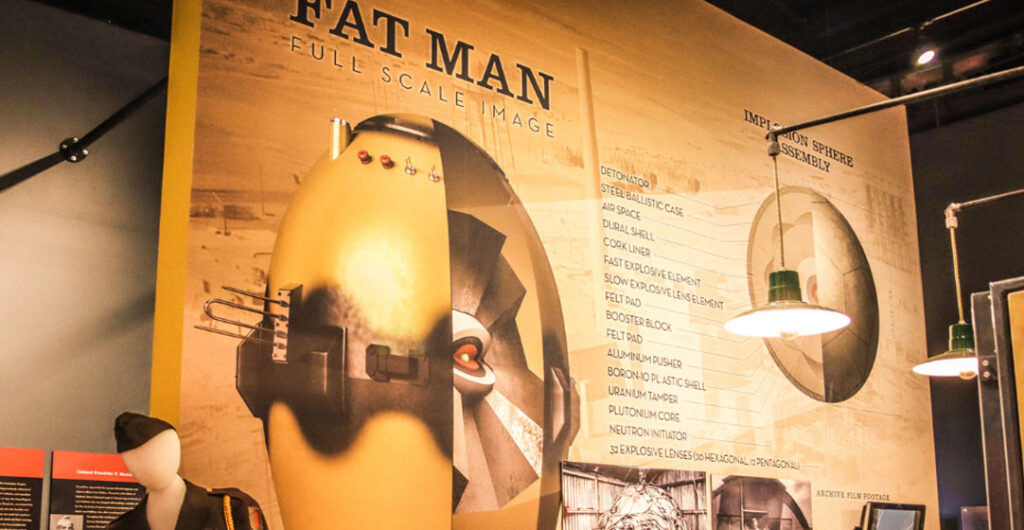 A large poster display at the REACH museum on one of the "Fat Man" atomic bombs that were developed by the Manhattan Project.    