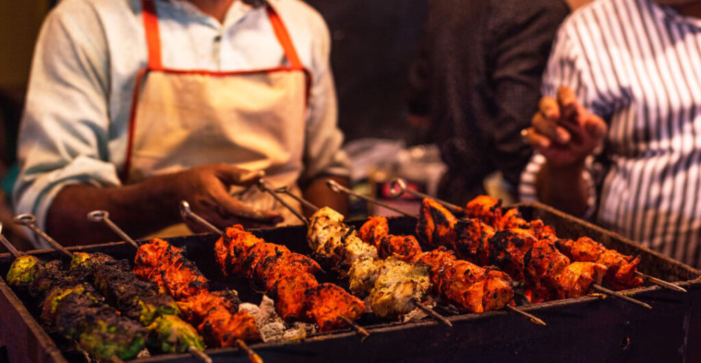 Explore India’s vibrant and diverse culinary scene on a foodie adventure tour and learn about classic dishes such as grilled tandoori.