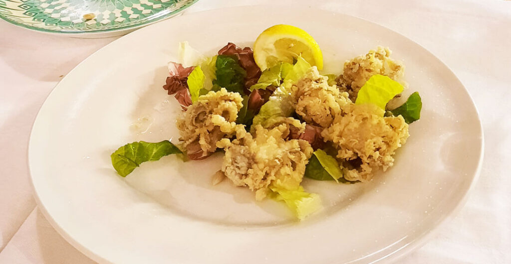 Some fried calamari served in a humble trattoria in Rome. 
