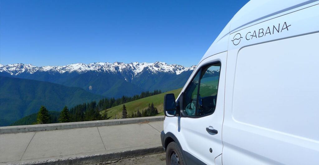 Stopping to enjoy the spectacular view of Hurricane Ridge while exploring Olympic National Park in a Cabana Camper Van.
