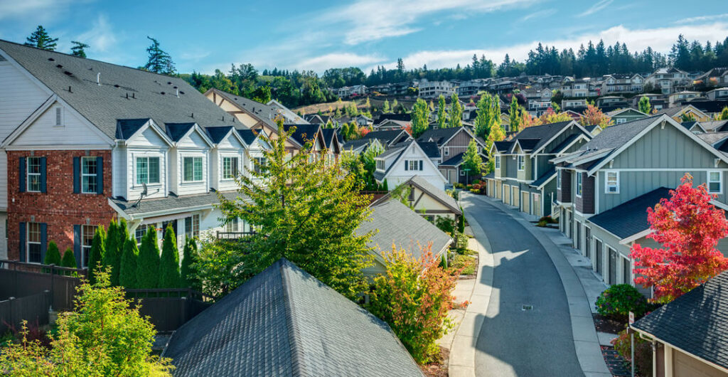 View of residential area in Issaquah Highlands. Learn the basics of home insurance before you buy your first home.