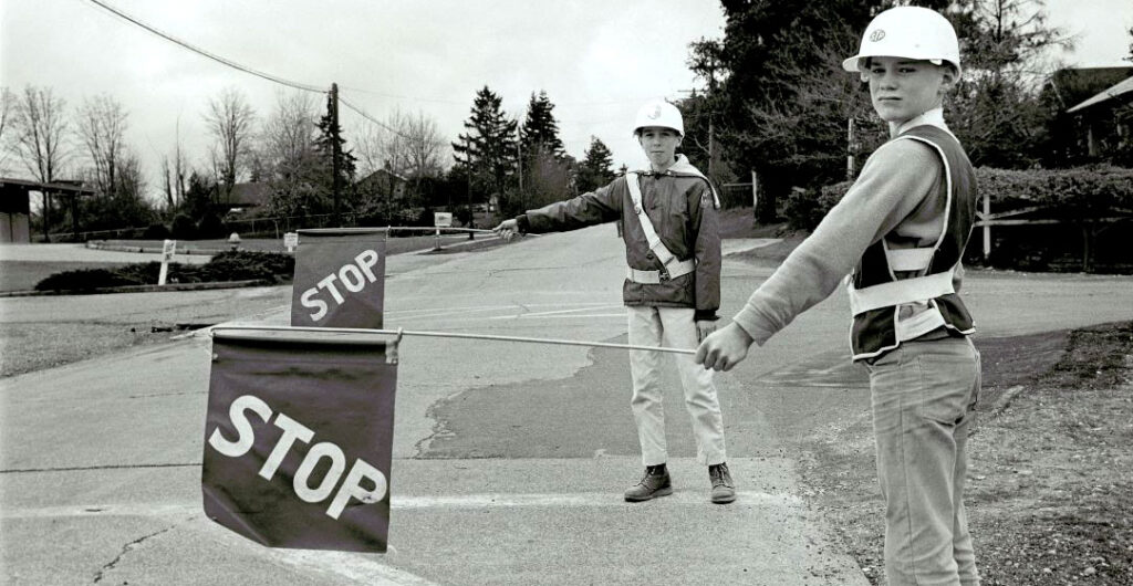 From the AAA archives, for more than 100 years, school crossing guards have been hard at work keeping their fellow students safe.