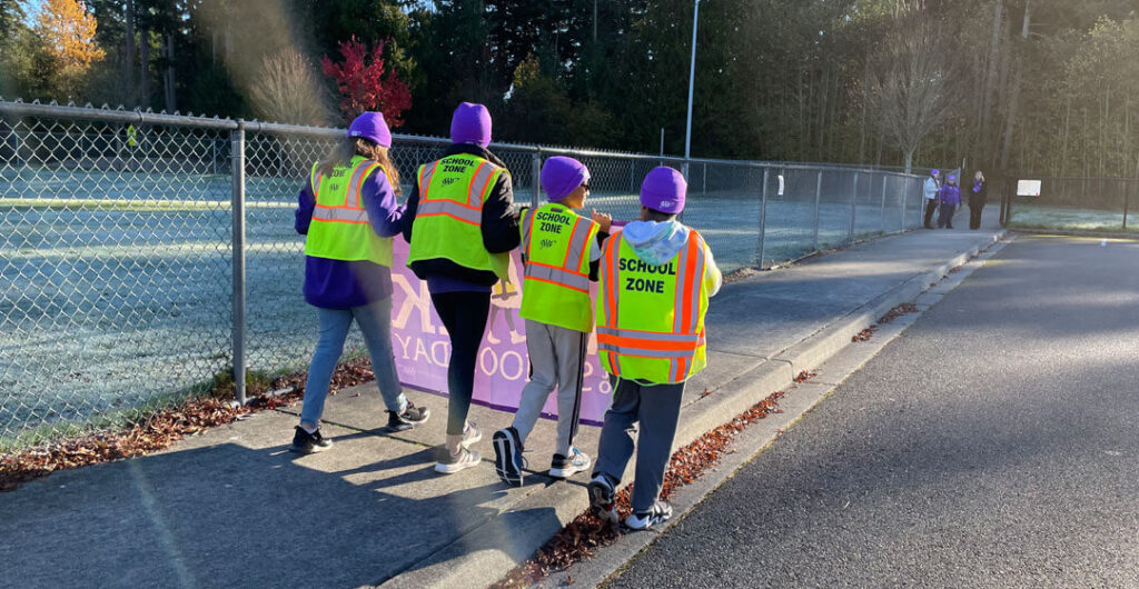 Members of the AAA Washington School Safety Patrol participate in Ruby Bridges Walk to School Day. 