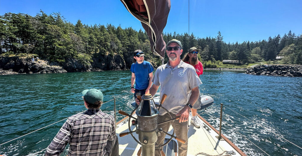 Captain Beemer takes the helm of The Black Pearl as the crew sails to Vendovi Island. 